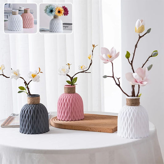 fleur dans differents vase sur table